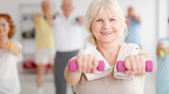 lady holding dumbbells